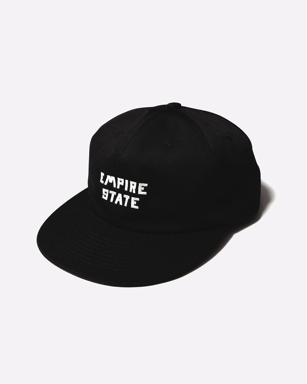 Unlikely 25AW Unlikely Souvenir Cap "EMPIRE STATE"
